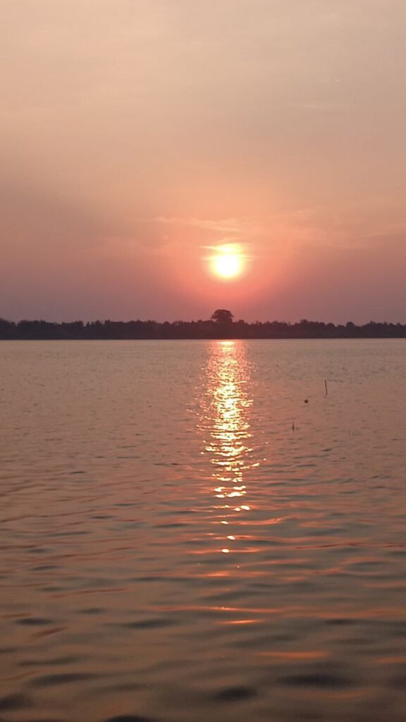 The golden reflection on the water helps wash away the stress of the day.