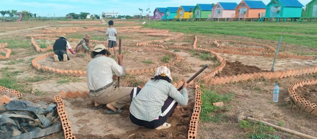 No boring straight lines here! We used the bricks to outline curved flower beds and circular zones. This breaks up the flat landscape and creates distinct 'rooms' for future planting.