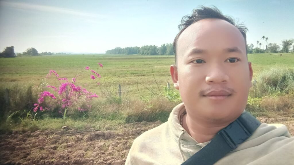 The 'before' moment: Standing in front of our massive, empty field in early 2023. It felt overwhelming at the time, but this was the blank canvas for Dream Garden.