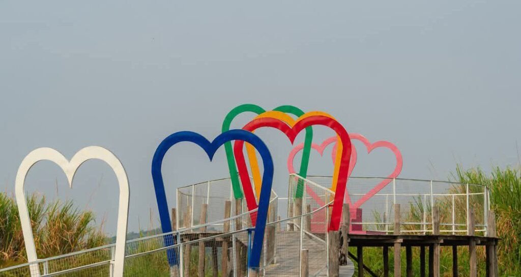 The finished result: Our "Love Bridge" features five heart arches standing 5 meters tall, designed to frame guests perfectly against the sky.