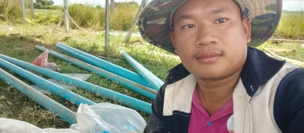 Me in "work mode" with the new materials. These blue PVC pipes aren't like the simple hoses we used back in the day—they require precise cutting, gluing, and pressure management.